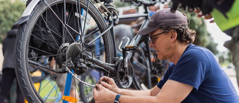 Illustrated bicycle repair shop entrance and professional service area