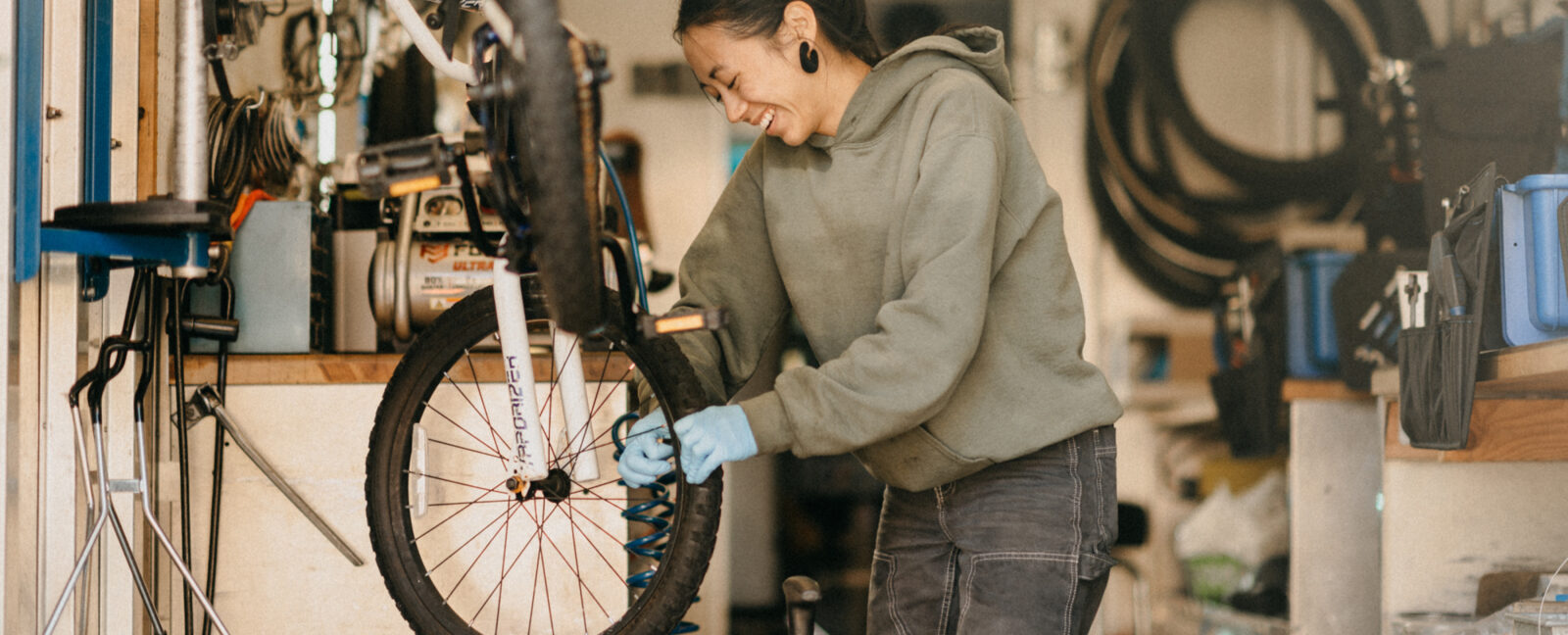 Illustrated bicycle tune-up with professional maintenance tools
